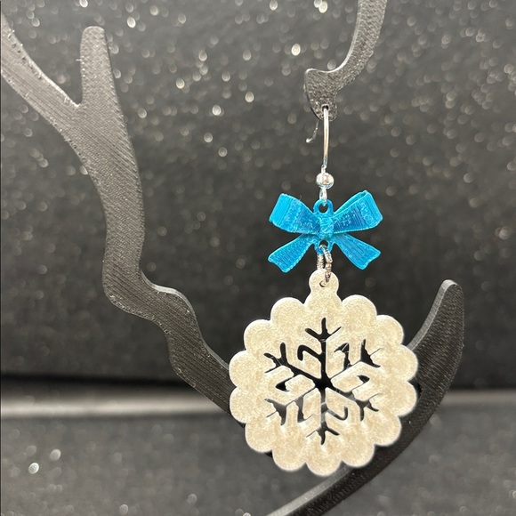 Elegant Snowflake Earrings with Blue Bow - Picture 3 of 3